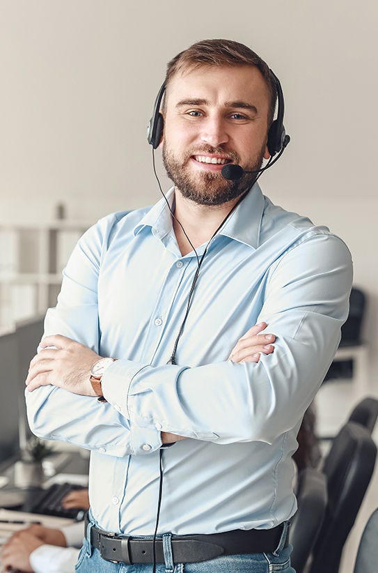 Portrait of male technical support agent in office